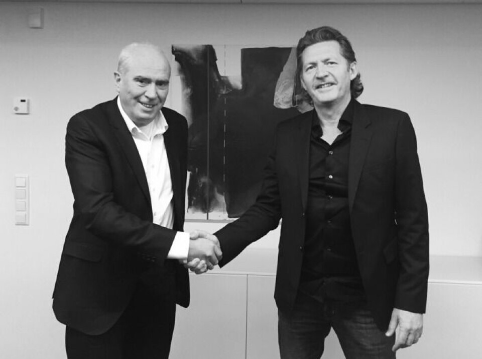 Styreleder i AMIS, Svein Jarle Hole og CEO i CSAM Sverre Flatby, da AMIS ble integrert i CSAM.